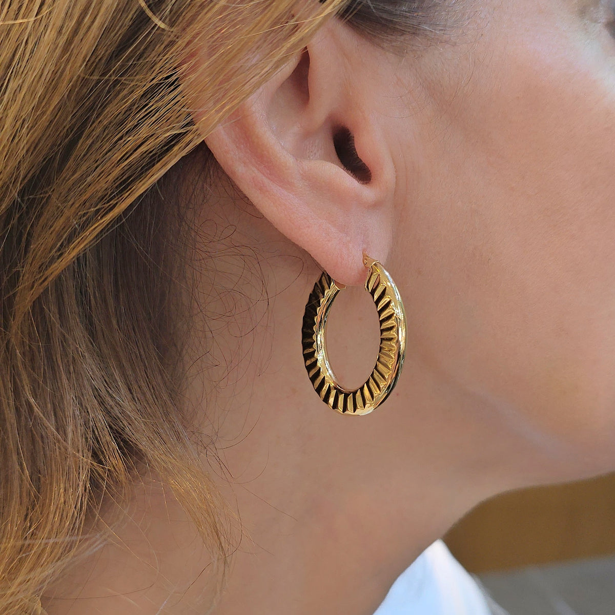 Solaris gold earrings