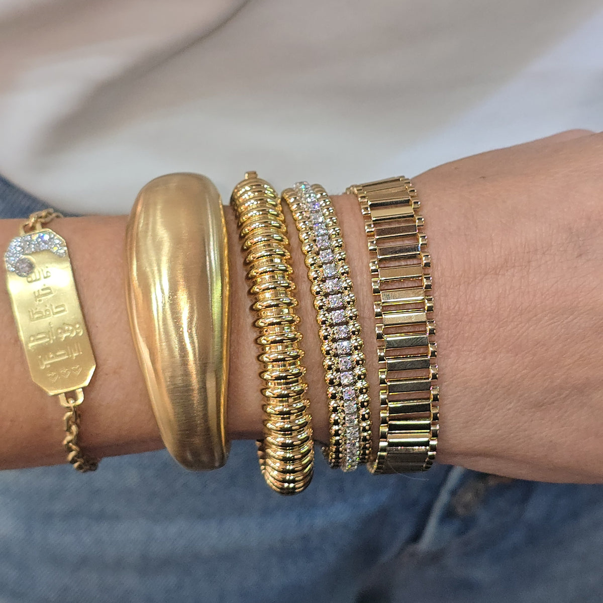 Watchstrap gold bracelet