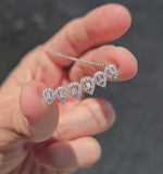 Load and play video in Gallery viewer, Tapered Diamond Pears Necklace
