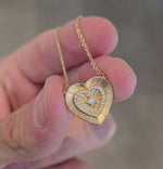 Load and play video in Gallery viewer, Gold-Brushed Radiant Heart Necklace

