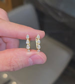 Load and play video in Gallery viewer, Classic Pear Diamond Hoops
