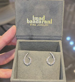 Load and play video in Gallery viewer, Graduating Pear Diamond Earrings
