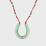 Load and play video in Gallery viewer, Knitted Horseshoe Necklace
