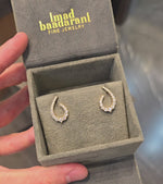 Load and play video in Gallery viewer, Graduating Pear Diamond Earrings
