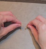 Load and play video in Gallery viewer, Triple-Heart Illusion Diamond Earrings
