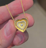 Load and play video in Gallery viewer, Gold-Brushed Radiant Heart Necklace
