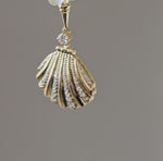 Load and play video in Gallery viewer, Golden Seashell Pendant
